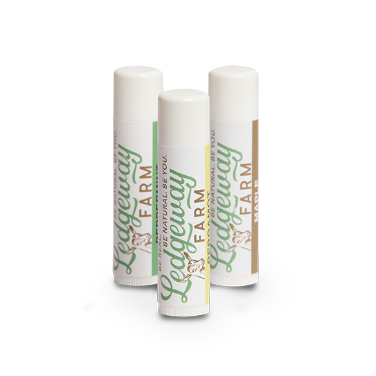 Three lip balm sticks from Ledgeway Farm on a white background