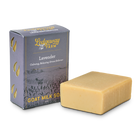Lavender goat milk soap at an angle with purple packaging.