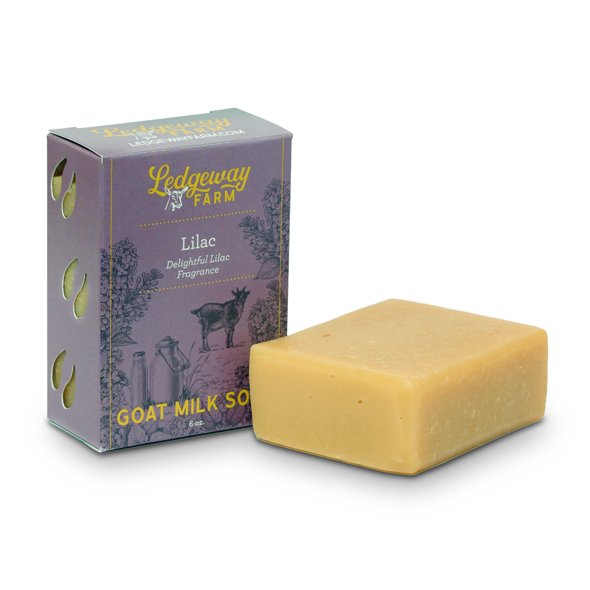 Lilac goat milk soap at an angle with the packaging.