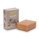 Bar of goat milk soap with packaging labeled 'Dirty Job' on a white background