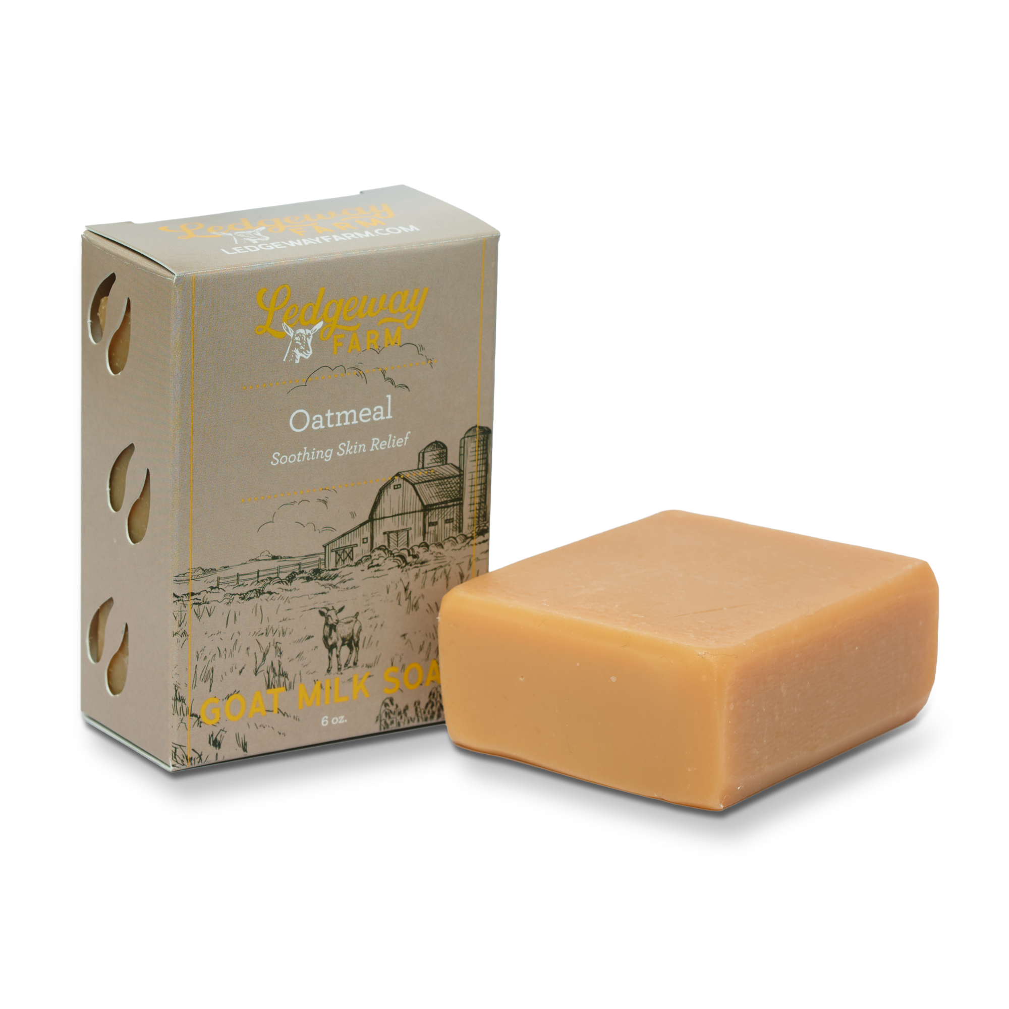 Goat milk soap bar with packaging on a white background