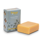 Bar of summer goat milk soap and its packaging on a white background