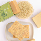Bar of soap with a green box labeled 'Lemongrass' on a white background