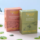 Two boxes of Ledgeway Farm goat milk soap on a light background with mint leaves.