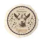 Shampoo label with a goat illustration and 'Ledgeway Farm' branding on a beige background.