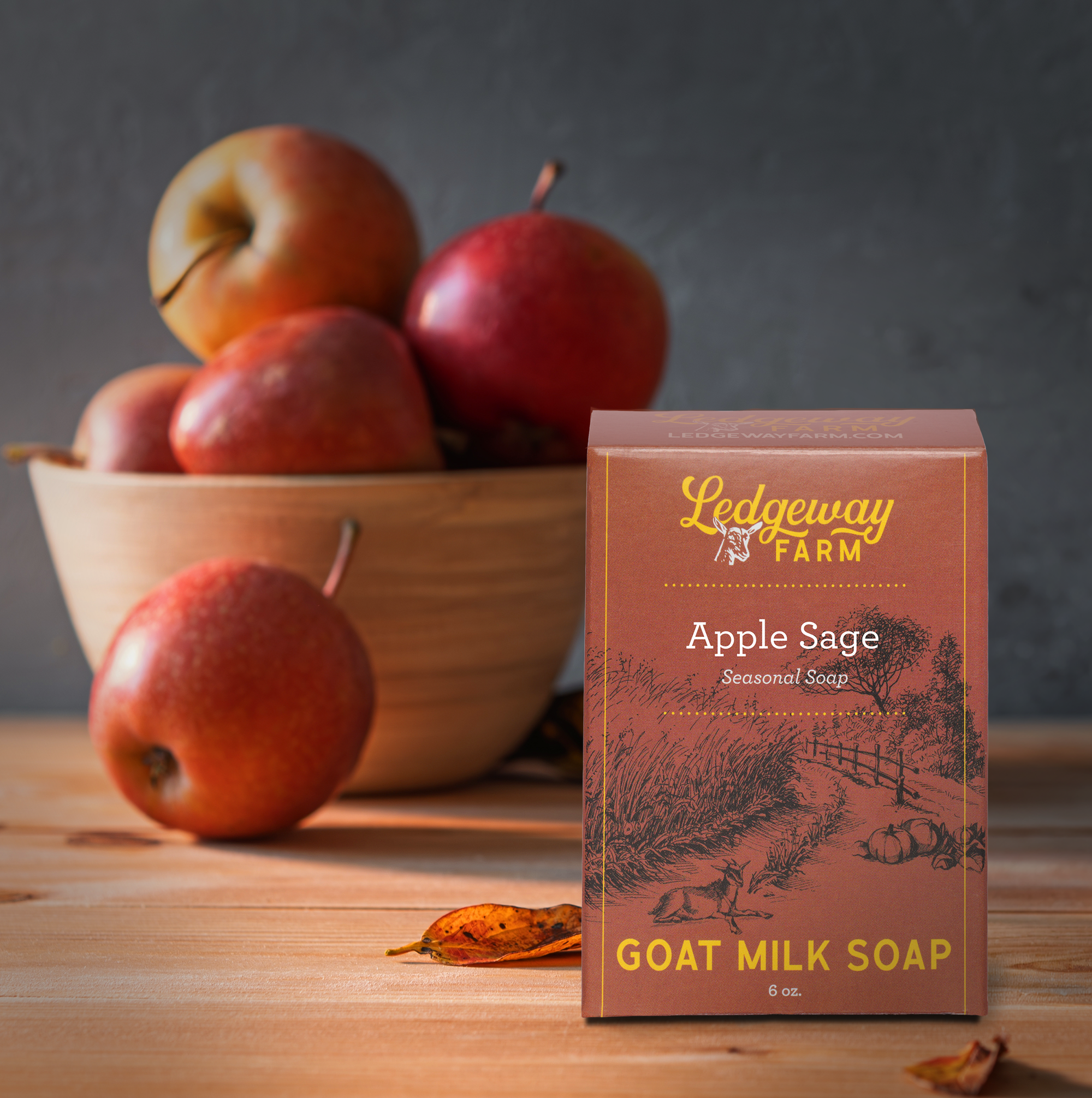 Ledgeway Farm Apple Sage goat milk soap packaging with apples in the background
